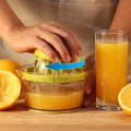 Manual Juicer / Fruit Squeezer with 17oz Built-in Strainer