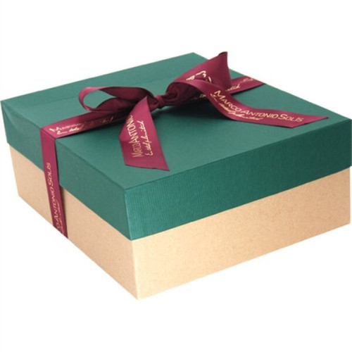 Four mugs in a gift box with ribbon